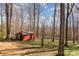 Spacious backyard featuring a red outbuilding, perfect for storage or a workshop at 412 Montana Dr, Gastonia, NC 28056