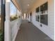 Long covered front porch with white railings, offering outdoor living space at 412 Montana Dr, Gastonia, NC 28056