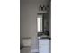 Bathroom features a granite countertop, undermount sink, modern vanity, and updated lighting at 4166 Saltwood Dr, Hickory, NC 28602