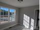 Bedroom with ample sunlight streaming through a large window at 4166 Saltwood Dr, Hickory, NC 28602