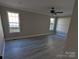 Primary bedroom with ceiling fan and views of the outside at 4166 Saltwood Dr, Hickory, NC 28602