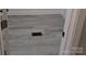 Bedroom with gray vinyl flooring, white trim, and interior door at 4166 Saltwood Dr, Hickory, NC 28602