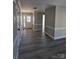 Inviting foyer with elegant trim work, hardwood floors, and a view of the front door and hallway at 4166 Saltwood Dr, Hickory, NC 28602