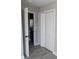 Hallway with closet doors and an interior door at 4166 Saltwood Dr, Hickory, NC 28602