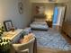 Cozy bedroom features a work area, a comfortable bed, and decor accents at 4340 Sequoia Red Ln, Charlotte, NC 28226