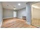 Cozy room featuring hardwood floors and neutral walls, perfect as an office space at 4340 Sequoia Red Ln, Charlotte, NC 28226