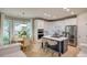 Bright eat-in kitchen with a center island, stainless steel appliances and white cabinetry at 4340 Sequoia Red Ln, Charlotte, NC 28226