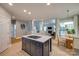 Open concept kitchen with center island and adjacent eat-in area; great for entertaining at 4340 Sequoia Red Ln, Charlotte, NC 28226