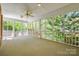 Inviting screened-in porch offers a peaceful place to enjoy the outdoors at 4340 Sequoia Red Ln, Charlotte, NC 28226