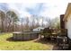 Relaxing backyard with an above ground pool and an inviting deck, perfect for summer fun and entertaining at 5212 Old Concord Rd, Salisbury, NC 28146