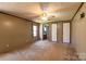Bedroom with carpet, ceiling fan, and two closets at 5212 Old Concord Rd, Salisbury, NC 28146