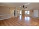 Comfortable living room featuring wood floors, neutral paint, and a ceiling fan at 5212 Old Concord Rd, Salisbury, NC 28146