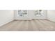 Bright bedroom featuring neutral carpet and two large windows at 642 Lamorak Pl, Richburg, SC 29729