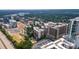 Expansive aerial view showcasing residential apartments, green spaces, and surrounding neighborhoods at 701 Royal Ct # 102, Charlotte, NC 28202