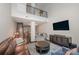 Spacious living room with loft area, high ceilings, and stylish modern decor at 701 Royal Ct # 102, Charlotte, NC 28202