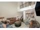 Lofted living room with high ceilings and expansive natural light at 701 Royal Ct # 102, Charlotte, NC 28202