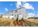 Attractive exterior view of a townhouse with a well-maintained backyard space at 8017 Downy Oak Ln, Charlotte, NC 28269