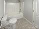 Bathroom featuring shower-tub combo at 8813 Gerren Ct, Charlotte, NC 28217