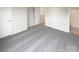 Spacious bedroom with neutral carpeting and attached bathroom at 8813 Gerren Ct, Charlotte, NC 28217