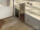 Back patio featuring a sliding door and white fence at 8813 Gerren Ct, Charlotte, NC 28217