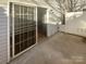 Private patio area with sliding glass doors, perfect for outdoor entertaining at 8813 Gerren Ct, Charlotte, NC 28217