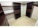 Custom walk-in closet with shelving, drawers, and ample storage space at 1000 High Brook Dr, Waxhaw, NC 28173