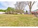 Large, grassy backyard with mature trees, sheds, and plenty of space at 107 Destiny Ln, Shelby, NC 28150