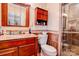 Updated bathroom with a single sink vanity, toilet, and tiled walk-in shower at 107 Destiny Ln, Shelby, NC 28150