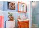 Bathroom featuring blue tiled walls and a pedestal sink at 107 Destiny Ln, Shelby, NC 28150