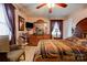 Cozy bedroom features a dresser with a vanity and natural light at 107 Destiny Ln, Shelby, NC 28150