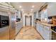 Traditional kitchen with modern stainless appliances, spacious counters, and blue cabinets at 107 Destiny Ln, Shelby, NC 28150