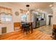 Cozy dining area adjacent to the kitchen, with a breakfast bar and modern lighting fixtures at 107 Destiny Ln, Shelby, NC 28150