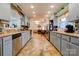 Spacious kitchen featuring blue cabinetry, stainless appliances, and views to the dining room at 107 Destiny Ln, Shelby, NC 28150