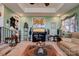 Comfortable living room with an open view, ceiling fan, coffered ceiling and lots of decor at 107 Destiny Ln, Shelby, NC 28150