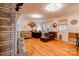 Cozy living room featuring hardwood floors, a fireplace, and a comfortable seating area at 107 Destiny Ln, Shelby, NC 28150