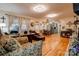 Open-concept living area featuring hardwood floors and a seamless flow into the kitchen at 107 Destiny Ln, Shelby, NC 28150
