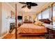 Spacious bedroom boasts hardwood floors, a fireplace, and a four poster bed at 107 Destiny Ln, Shelby, NC 28150