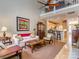 Spacious living room with high ceilings, hardwood floors, and seamless flow to a modern kitchen at 1141 Hollyheath Ln, Charlotte, NC 28209