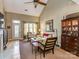 Bright living room with high ceilings, ample seating, and a cozy fireplace, perfect for relaxing or entertaining at 1141 Hollyheath Ln, Charlotte, NC 28209