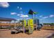 Community playground featuring a modern playset on a mulched surface with a picnic shelter nearby at 117 Lightning Dr, Shelby, NC 28152