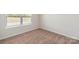 Bright carpeted bedroom with fresh paint and large windows provides natural light at 123 Lightning Dr, Shelby, NC 28152