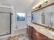 Bathroom with a large vanity, jacuzzi tub and separate shower at 12308 Ridge Cove Cir, Charlotte, NC 28273