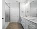 Bright bathroom with double sink vanity, modern fixtures, and sleek glass enclosed shower at 149 Prestwick Way # 39, Mooresville, NC 28115