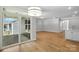 Open living area with hardwood floors, sliding door and backyard access at 149 Prestwick Way # 39, Mooresville, NC 28115