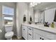 Bright bathroom features a double vanity, and a shower/tub combination at 16764 Summers Walk Blvd, Davidson, NC 28036