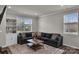 Living room with large sectional couch, an area rug, and natural light at 16764 Summers Walk Blvd, Davidson, NC 28036