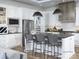 Modern kitchen with island, bar stool seating, stainless steel appliances, and plenty of storage at 19035 Newburg Hill Rd, Davidson, NC 28036