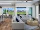 Bright open-plan living area with access to a patio, and combined seating and dining at 19035 Newburg Hill Rd, Davidson, NC 28036