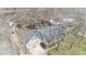 An elevated view showing the house with a 3-car garage, mature trees and detailed landscaping at 2622 Oakhurst Dr # 23, Rock Hill, SC 29730