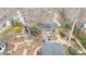 Overhead shot showcasing a lush backyard with a shaded gazebo, koi pond, and wooded perimeter at 2622 Oakhurst Dr # 23, Rock Hill, SC 29730